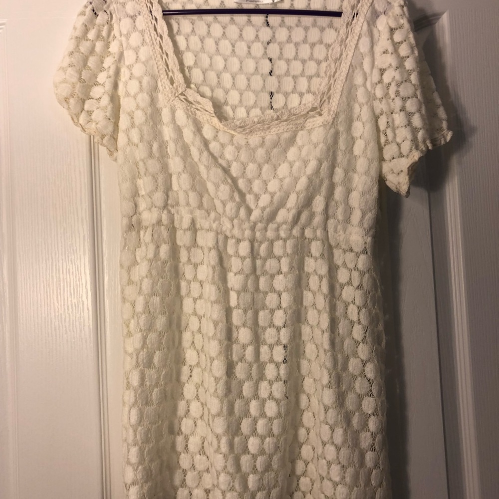 Beautiful ivory blouse. Never worn. Size L